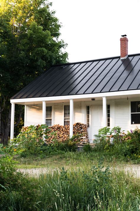 ranch style house metal roof|white farmhouse with metal roof.